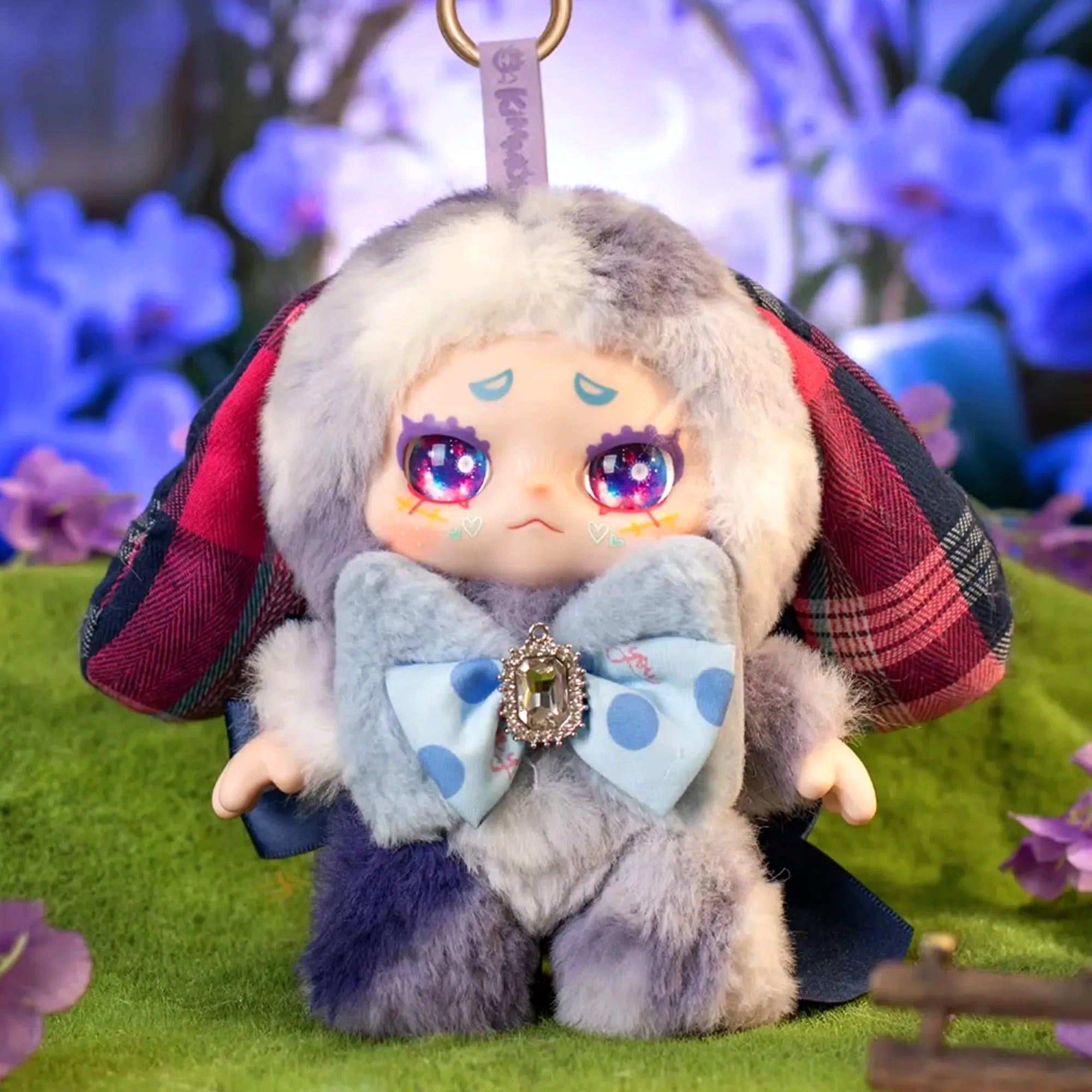 Kimmon Spring New Growth colourful long-eared themed premium plush doll in an orchid flower green field setting.