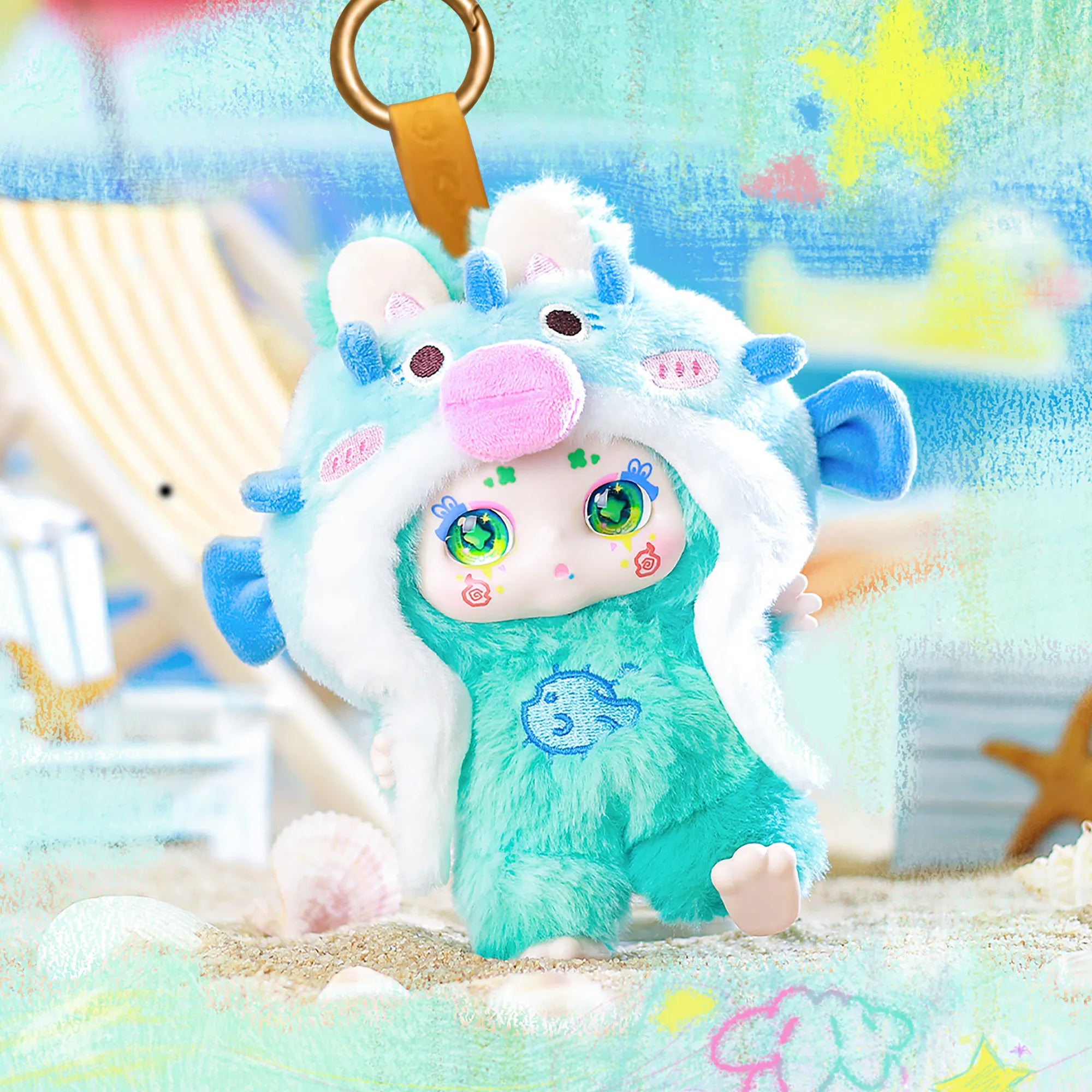 Kimmon Over The Moon cute colourful fish themed premium plush doll in a beach scene setting.